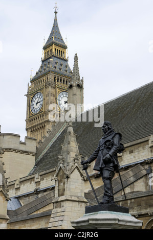 Oliver Cromwell statue and Big Ben outside the Houses of Parliament in London, England, UK Stock Photo