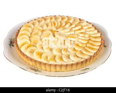 Freshly Made Homemade Fresh Banana Flan In A pastry Crust Base Against A White Background With No People And A Clipping Path Stock Photo