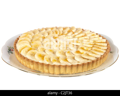 Freshly Made Homemade Fresh Banana Flan In A pastry Crust Base Against A White Background With No People And A Clipping Path Stock Photo