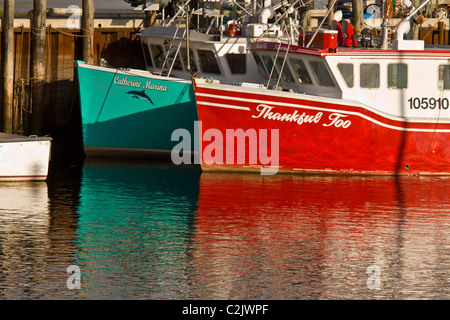 Colorful lobster boats in the village of Alma, New Brunswick, Canada Stock Photo