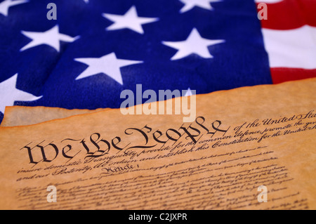 Preamble to the US Constitution with the stars and stripes in the background Stock Photo