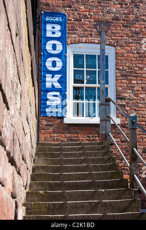 CHESTER, CHESHIRE, UK - APRIL 10, 2011:  Stairs on Chester City Wall leading to Bluecoat Bookshop Stock Photo