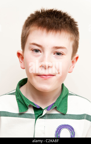 A MODEL RELEASED picture of an eleven year old boy indoors Stock Photo