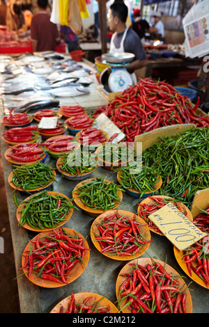Chillies, fruit, vegetables, meat and fish for sale at the Chow Kit Market in Kuala Lumpur, Malaysia Stock Photo