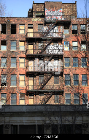 Abandoned building with fire ladder in downtown Detroit Michigan USA 2011 Stock Photo