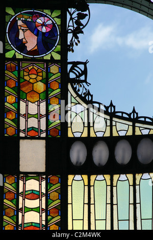 Art Nouveau stained glass decoration by Alfons also Alphonse Mucha at the main entrance to Obecni Dum Municipal House a civic building that houses Smetana Hall, a celebrated concert venue in Nove Mesto district in Prague Czech Republic Stock Photo