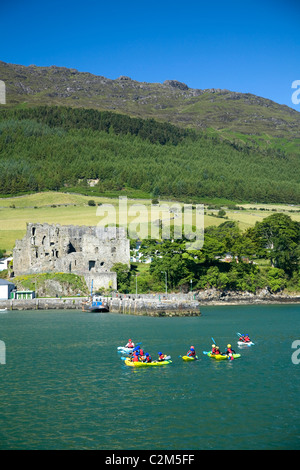 Sea kayaking group in Carlingford Lough, beneath Slieve Foy. County Louth, Ireland. Stock Photo