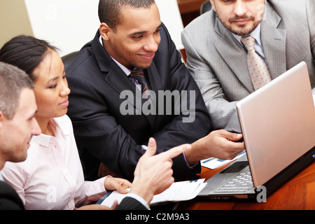 Multi ethnic business team at a meeting Stock Photo