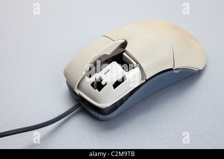 Broken computer mouse close up Stock Photo