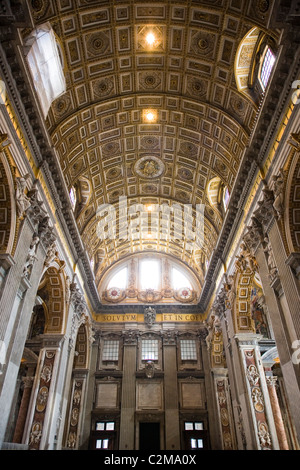 The ceiling and columns looking towards the entrance, St Peter's Basilica, Vatican City, Rome, Italy Stock Photo