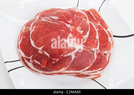 mutton slices cooked in hot pot Stock Photo