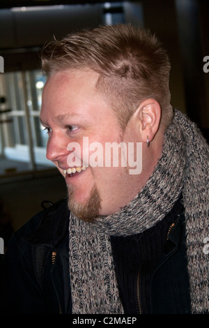 Handsome man 34 happy with scarf around neck. St Paul Minnesota MN USA Stock Photo