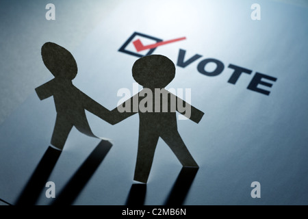 vote and Paper Chain Men close up Stock Photo