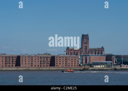 Skyline view of the renovated Albert Docks with Liverpool Cathedral in the background, Liverpool, Merseyside, England Stock Photo