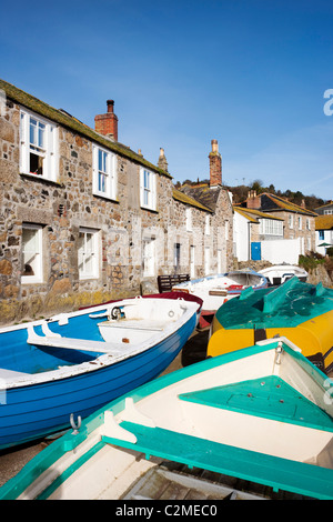 Colourful boats on the harbour side at Mousehole, Land's End, Cornwall, England Stock Photo