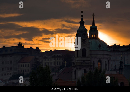 View of St Nicholas Church at sunset, Prague, Czech Republic Stock Photo