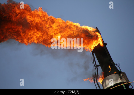 Huge flames leak from a gas pipe Stock Photo