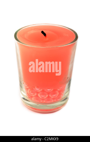 Red candle in glass isolated on white background. Red candle in glass isolated on white background.