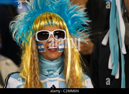An Argentina supporter in the stands at Soccer City Stadium prior to a 2010 World Cup match between Mexico and Argentina. Stock Photo