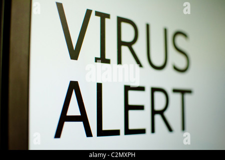 Detail of Virus Alert Sign on LCD Screen Stock Photo