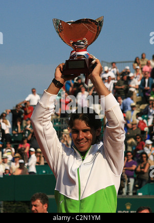 Rafael Nadal made history as he claimed his seventh successive Monte Carlo Masters title with a 6-4 7-5 victory over David Ferre Stock Photo