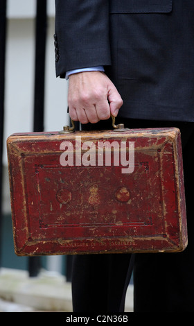 Former Chancellor of the Exchequer, the Right Hon Alistair Darling MP, leaves Number 11 Downing street with the 2009 Budget. Stock Photo