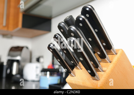 Set of quality Sabatier cooks knives in a modern kitchen Stock Photo