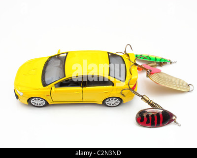 The car of yellow color caught on a spinner for the big predatory fish Stock Photo