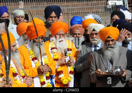 Sikh religious leaders in ceremony outside Guru Nanak Gurdwara ...