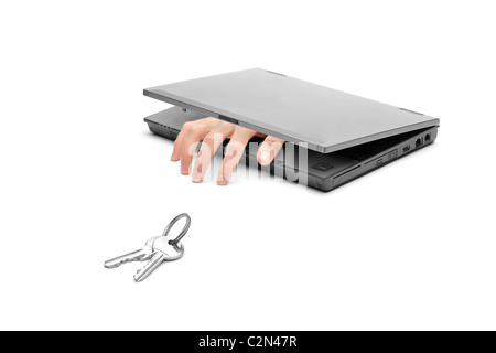 A hand coming out of a laptop trying to reach door keys Stock Photo