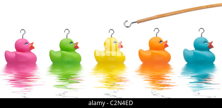 Colourful Rubber Ducks with water ripples and hook about to win one Stock Photo
