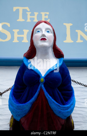 Ship figurehead display sign on the pub / tavern 'The Ship Inn', on The Coombe, in Polperro. Cornwall. UK. Stock Photo