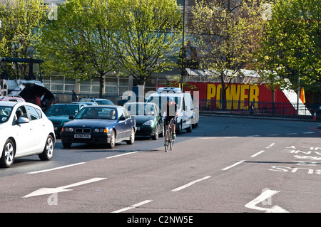 Cyclist, Elephant and Castle northern roundabout, Southwark, London, UK Stock Photo