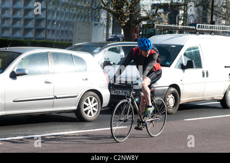 Cyclist, Elephant and Castle northern roundabout, Southwark, London, UK Stock Photo