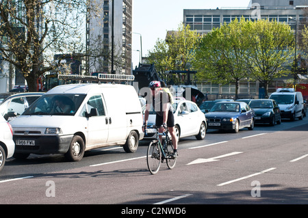 Cyclist, Elephant and Castle northern roundabout, Southwark, London, UK Stock Photo