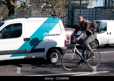 Cyclist, Elephant and Castle northern roundabout, Southwark, London, UK Stock Photo