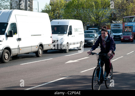 Cyclist, Elephant and Castle northern roundabout, Southwark, London, UK Stock Photo