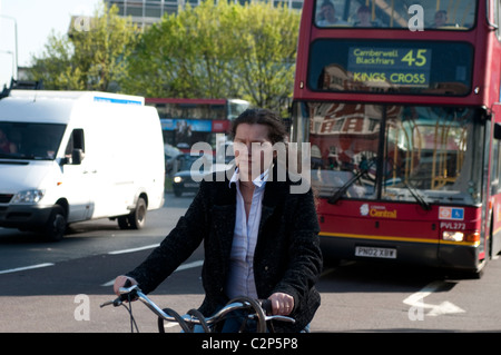 Cyclist, Elephant and Castle northern roundabout, Southwark, London, UK Stock Photo