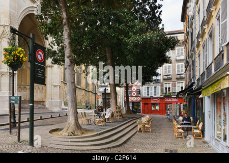 Cafe in front of the Cathedral of Sainte Marie, Place Pasteur, Grand Bayonne quarter, Bayonne (Baiona), Cote Basque, France Stock Photo