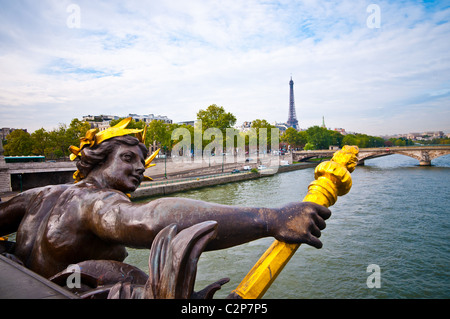 View on Seine River and Eiffel Tower from Alexander III bridge (pont Alexandre III) in Paris, France. Stock Photo