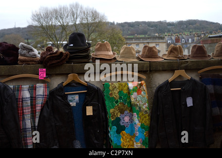 Jackets and secondhand clothes for sale Walcot Saturday Market Bath Somerset UK Stock Photo