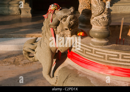 stone lion statue at Taoist Chinese Temple in Georgetown, Penang, Malaysia Stock Photo