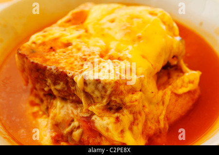 A Francesinha sandwich is served in Porto, Portugal. Stock Photo
