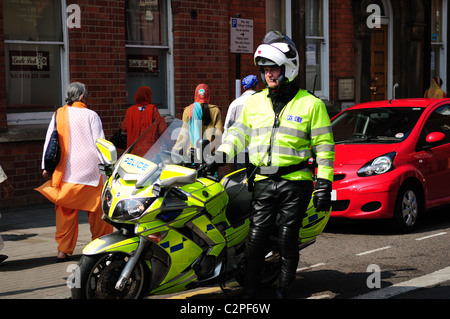 British Police Motorcyclist on Duty. Stock Photo