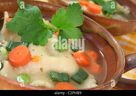 Pasta squares filled with meat and spinach Stock Photo