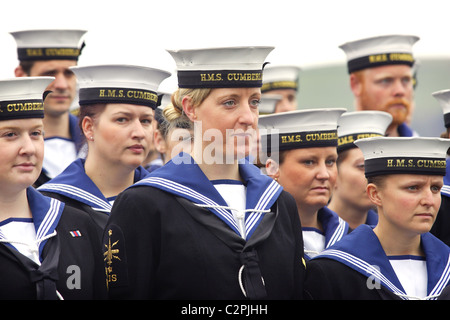 Members of HMS Cumberland's crew prepare to leave the ship after a 7 month deployment. Stock Photo