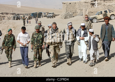 ISAF soldiers and Afghan soldiers on patrol, Feyzabad, Afghanistan Stock Photo