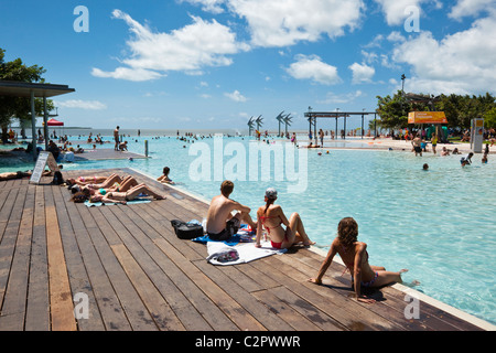 Swimmers at the Esplanade Lagoon. Cairns, Queensland, Australia Stock Photo