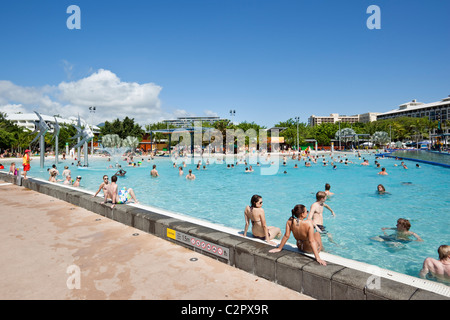 Swimmers at the Esplanade Lagoon. Cairns, Queensland, Australia Stock Photo