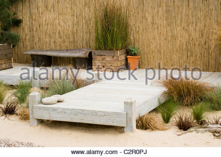 Garden seating on wooden decking, overlooking wildlife 